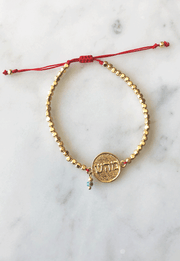 Pulsera Salud dorado